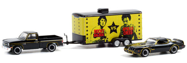 GREENLIGHT 1981 Chevrolet C-10 Custom Deluxe with Rocky's 1979 Pontiac Firebird Trans Am in Enclosed Car Hauler
Rocky II (1979)